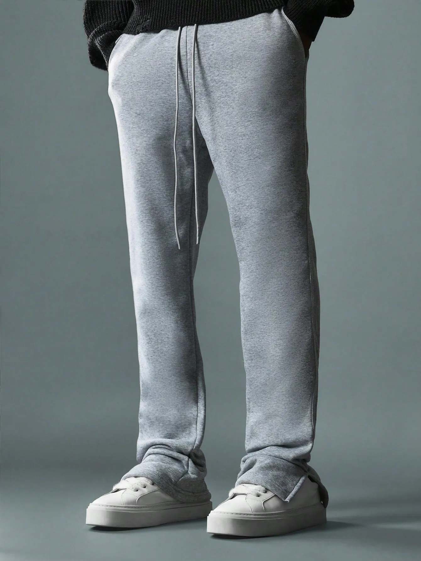 Flare Fit Expose Seam Sweatpants With Side Leg Split