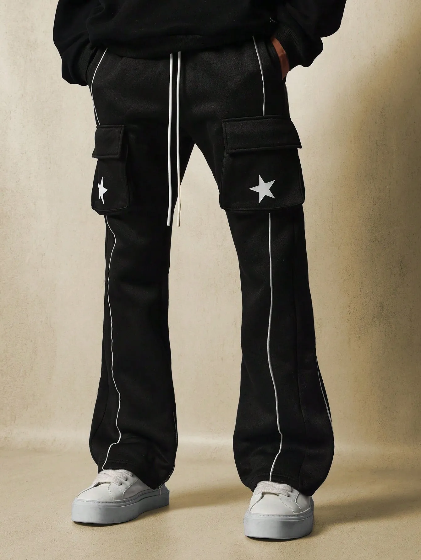 Flare Fit Exposed Pocket Cargo Sweatpants With Star Graphic Print & Piping