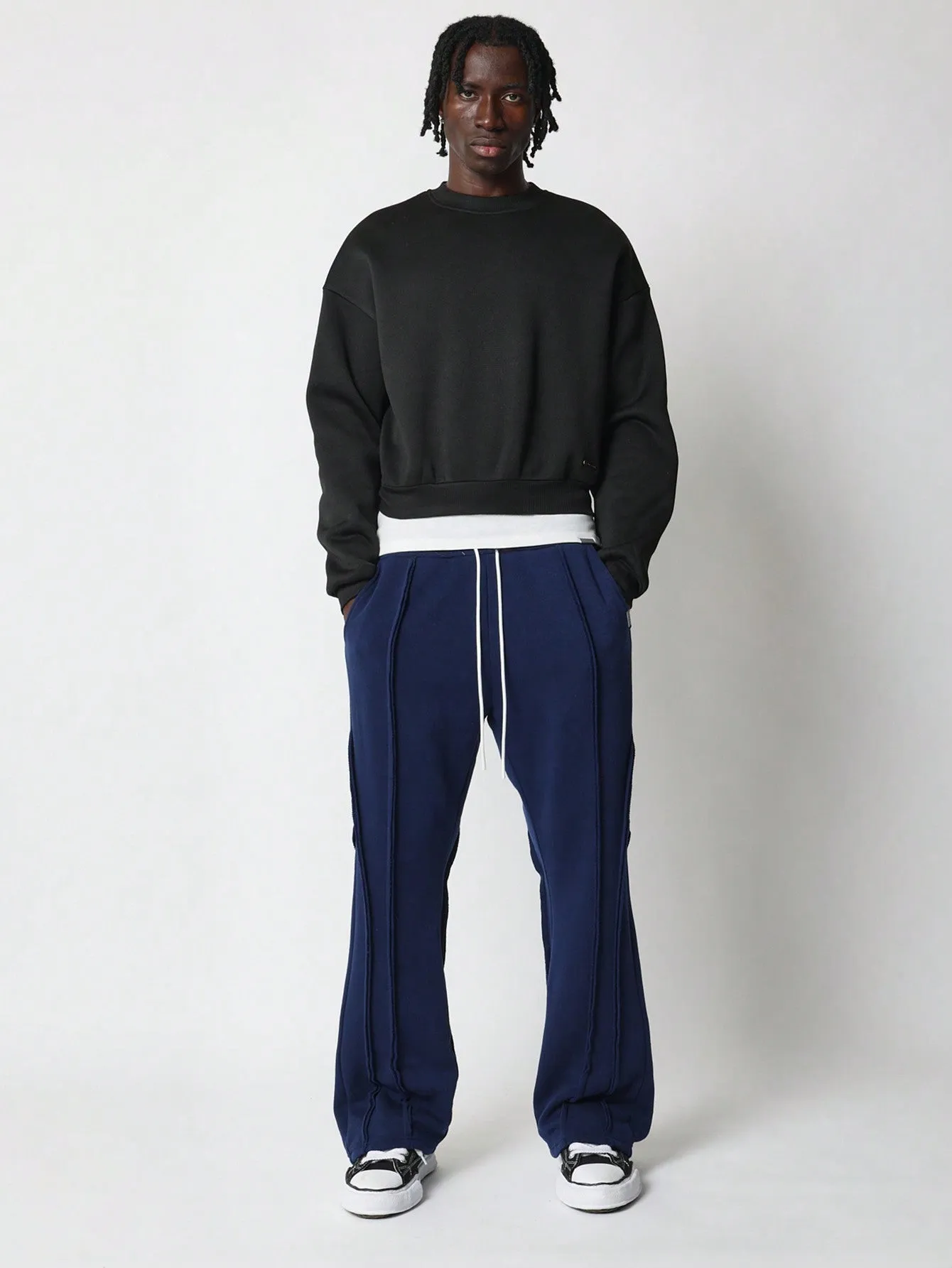 Flare Fit Multi Raw Edge Exposed Seam Sweatpants With Drawcord