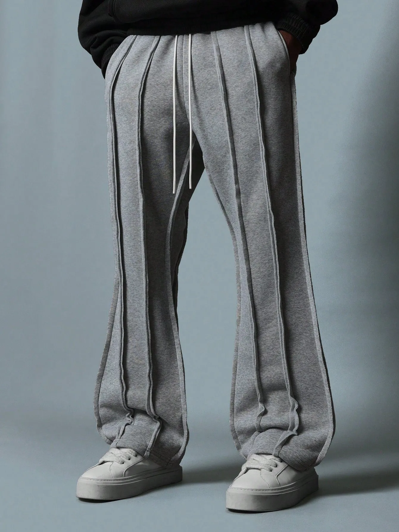 Flare Fit Multi Seamed Raw Edge Sweatpants With Drawstrings