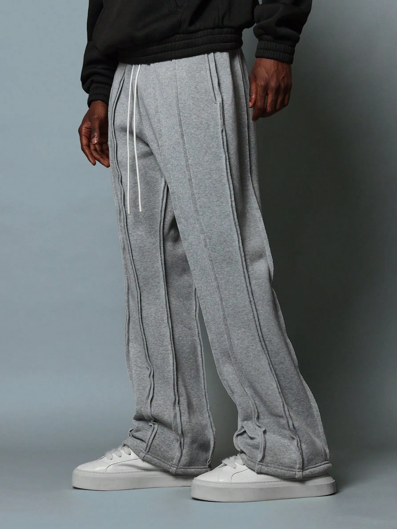 Flare Fit Multi Seamed Raw Edge Sweatpants With Drawstrings